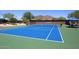 Well-maintained tennis court with mountain views, available for residents at 6939 E Bramble Berry Ln, Scottsdale, AZ 85266
