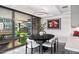 Inviting dining area with large windows offering natural light and views of the outdoor greenery at 7141 E Rancho Vista Dr # 6007, Scottsdale, AZ 85251