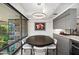Modern dining area with stylish lighting, sleek cabinetry, and beautiful outdoor views at 7141 E Rancho Vista Dr # 6007, Scottsdale, AZ 85251