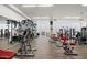 Bright gym featuring cardio and weight equipment with mirrors for a full body workout at 7141 E Rancho Vista Dr # 6007, Scottsdale, AZ 85251