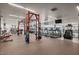 State-of-the-art gym features weight training and cardio equipment with views of a pool at 7141 E Rancho Vista Dr # 6007, Scottsdale, AZ 85251
