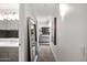Inviting hallway showcases an open view into the bedroom, complemented by modern lighting and elegant decor at 7141 E Rancho Vista Dr # 6007, Scottsdale, AZ 85251