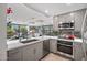 Contemporary kitchen featuring stainless steel appliances, ample counter space, and scenic views at 7141 E Rancho Vista Dr # 6007, Scottsdale, AZ 85251