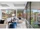 Bright living room with large windows overlooking a lush outdoor view and stylish, comfortable furnishings at 7141 E Rancho Vista Dr # 6007, Scottsdale, AZ 85251