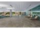 Spacious indoor pool area with lounge chairs and easy access to a private outdoor retreat at 7141 E Rancho Vista Dr # 6007, Scottsdale, AZ 85251