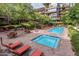 Inviting community pool and spa surrounded by lounge seating and lush landscaping at 7141 E Rancho Vista Dr # 6007, Scottsdale, AZ 85251