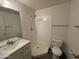 Clean bathroom featuring a walk-in shower, white cabinets and modern fixtures at 7905 W Thunderbird Rd # 305, Peoria, AZ 85381