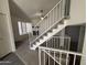 Open floor plan featuring a living room with a fireplace and staircase at 7905 W Thunderbird Rd # 305, Peoria, AZ 85381
