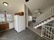 Open floor plan showcasing the kitchen, living room, and staircase at 7905 W Thunderbird Rd # 305, Peoria, AZ 85381