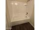 Bathroom with a white tiled shower and tub, providing a clean and simple bathing space at 7905 W Thunderbird Rd # 307, Peoria, AZ 85381
