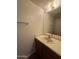 This bathroom features vanity with light-colored countertop and neutral wall color at 7905 W Thunderbird Rd # 307, Peoria, AZ 85381