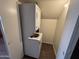 Cozy laundry area with stacked washer and dryer for space-saving convenience at 7905 W Thunderbird Rd # 307, Peoria, AZ 85381