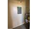 Utility area featuring a water heater and electrical panel, necessary for home functioning at 7905 W Thunderbird Rd # 307, Peoria, AZ 85381
