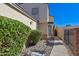 Home exterior with drought-tolerant landscaping and gated access on a sunny day at 9043 N 14Th Dr, Phoenix, AZ 85021