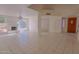 Bright living room featuring tile flooring, a fireplace, and lots of natural light at 9043 N 14Th Dr, Phoenix, AZ 85021