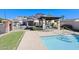 Relaxing community pool with a pergola and lounge area great for socializing and unwinding at 9043 N 14Th Dr, Phoenix, AZ 85021