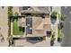 Aerial view of house with new solar panels, roof, backyard and patio at 9727 E Torino Ave, Mesa, AZ 85212
