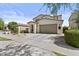 Charming two-story home featuring a neutral color palette and a spacious two-car garage at 9727 E Torino Ave, Mesa, AZ 85212