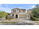 Charming two-story home featuring a neutral color palette and a spacious two-car garage at 9727 E Torino Ave, Mesa, AZ 85212