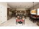 Open concept kitchen with a large island, breakfast table, and ample seating at 9842 E Celtic Dr, Scottsdale, AZ 85260