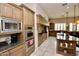 Well-equipped kitchen with custom cabinetry, granite countertops, and stainless appliances at 9842 E Celtic Dr, Scottsdale, AZ 85260