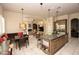 Open concept kitchen and living area with a large kitchen island at 9842 E Celtic Dr, Scottsdale, AZ 85260