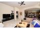 Spacious living room with an open floor plan into the kitchen at 9842 E Celtic Dr, Scottsdale, AZ 85260