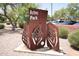 Aztec Park entrance sign surrounded by trees and parked cars under a bright blue sky at 9842 E Celtic Dr, Scottsdale, AZ 85260