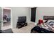 Nicely sized bedroom with a tv, a window and neutral carpeting at , Avondale, AZ 85323
