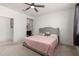 Spacious main bedroom with a ceiling fan and ensuite bathroom access at , Avondale, AZ 85323