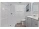 Bright bathroom featuring a shower and vanity at 10201 N 97Th Ave # B, Peoria, AZ 85345