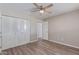 Bedroom with a fan and closet at 10201 N 97Th Ave # B, Peoria, AZ 85345