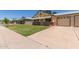 Charming single-Gathering home featuring a well-maintained front yard and a two-car garage at 10201 N 97Th Ave # B, Peoria, AZ 85345