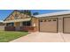 Charming single Gathering home featuring a well-maintained front yard and a two-car garage at 10201 N 97Th Ave # B, Peoria, AZ 85345