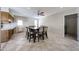 Dining area with tile flooring connects the kitchen and other living spaces at 10858 E Sahuaro Dr, Scottsdale, AZ 85259