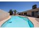 Backyard pool offers a refreshing oasis with easy access to the house at 10858 E Sahuaro Dr, Scottsdale, AZ 85259