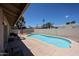 Private backyard pool offers a refreshing oasis with ample space for relaxation and entertainment at 10858 E Sahuaro Dr, Scottsdale, AZ 85259