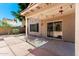 Back patio with overhead lighting, and sliding glass door to interior at 1334 E Helena Dr, Phoenix, AZ 85022