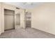 Bedroom with carpet floor and large closet with mirrored doors at 1334 E Helena Dr, Phoenix, AZ 85022
