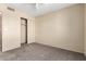 Bedroom featuring carpet flooring and a double door closet at 1334 E Helena Dr, Phoenix, AZ 85022