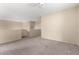 Bonus room with neutral paint and carpet is spacious and bright at 1334 E Helena Dr, Phoenix, AZ 85022