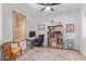 Bright home office with natural light, stylish decor, and comfortable workstation at 13420 W Berridge Ln, Litchfield Park, AZ 85340