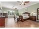 Relaxing bedroom features natural light, detailed millwork, and generous proportions for comfortable living at 14426 W Becker Ln, Surprise, AZ 85379