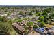 Aerial of property with spacious backyard, mature trees, and a detached structure at 1720 W Elm St, Phoenix, AZ 85015