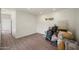 Bright basement with wood flooring and modern window, with a convenient access door at 1720 W Elm St, Phoenix, AZ 85015