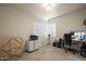 Office room with tile floors, white walls, and natural lighting at 1720 W Elm St, Phoenix, AZ 85015
