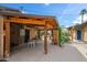 Covered patio with wood beams and outdoor seating at 1720 W Elm St, Phoenix, AZ 85015