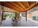 Covered patio with outdoor seating and string lights at 1720 W Elm St, Phoenix, AZ 85015