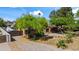 Charming home with a spacious backyard and RV parking, surrounded by mature trees at 1720 W Elm St, Phoenix, AZ 85015