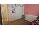 Bedroom with a closet, dresser and leopard print bedspread at 20217 W Desert Bloom St, Buckeye, AZ 85326